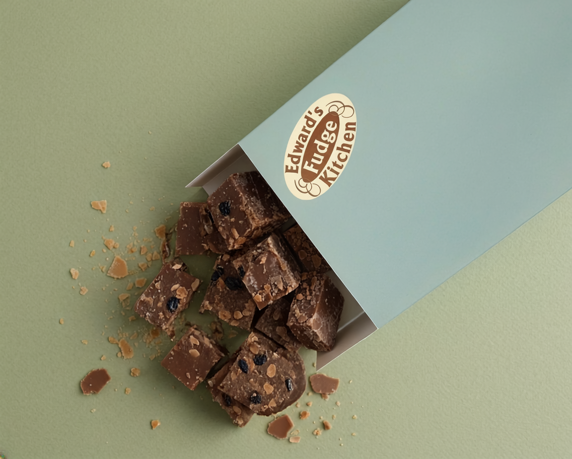 Box of chocolate fudge with 'Edward's Fudge Kitchen' logo on a green and blue box 300g background