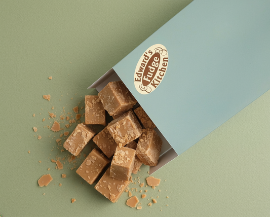 Box of fudge with 'Edwards fudge Kitchen' logo on a green and blue background